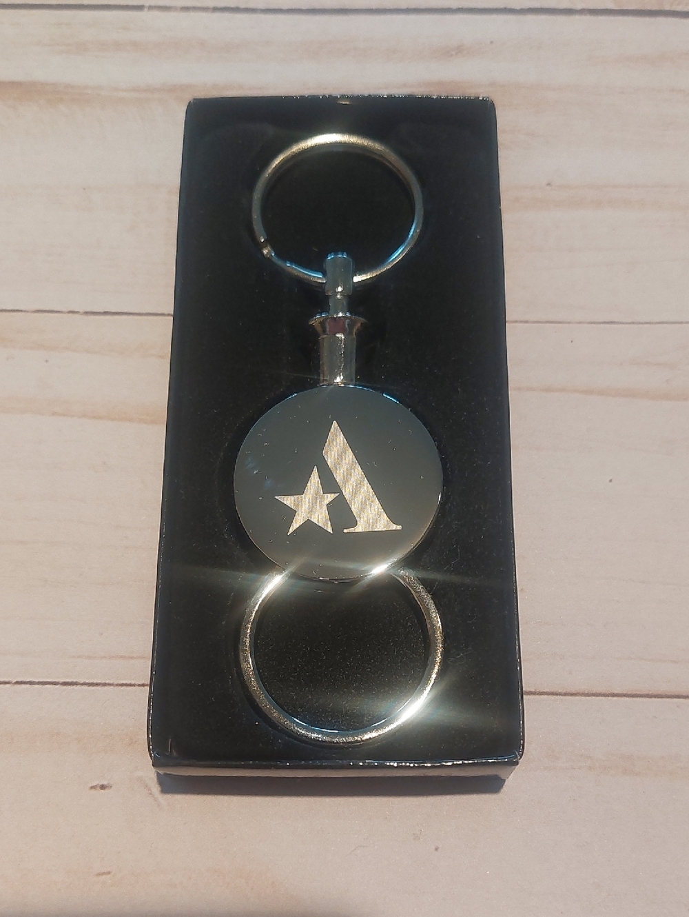 Silver Metal Keychain with Star & 'A' Logo